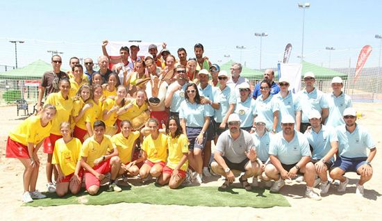 Volunteers, referees and the medallists of the beach volleyball competitions