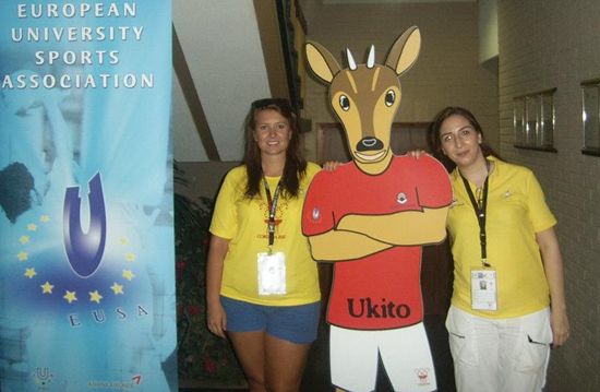 Ukito - the mascot - and the volunteers