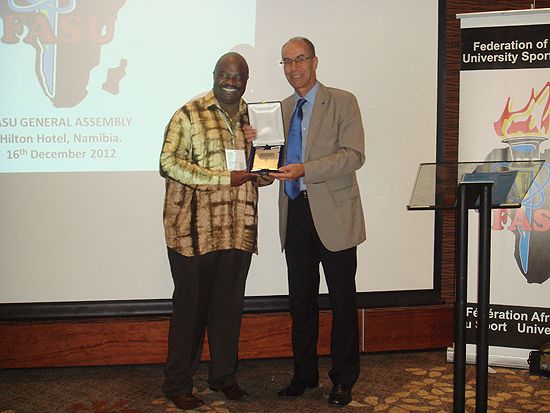 FASU President Malumbete Ralethe receiving EUSA plaquette from Vice-President Leonz Eder