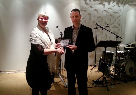 ENGSO President Mrs Kervinen receiving a EUSA plaquette