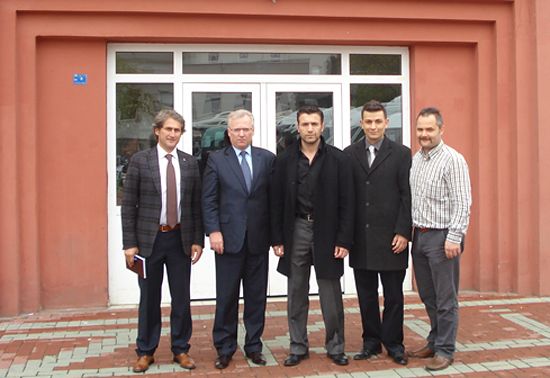 Mr Hrehorowicz with the Organising Committee in front of the Sports Hall