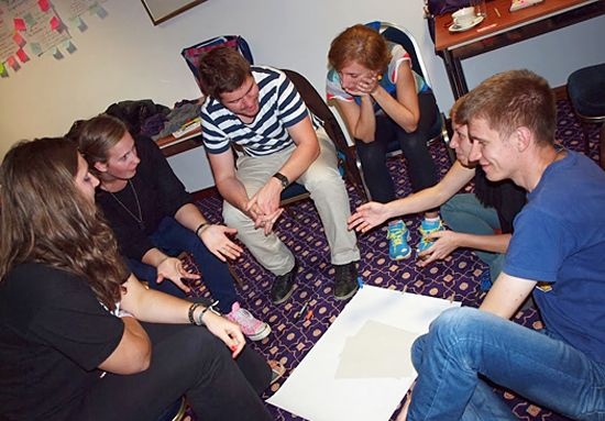 Young volunteers working in groups