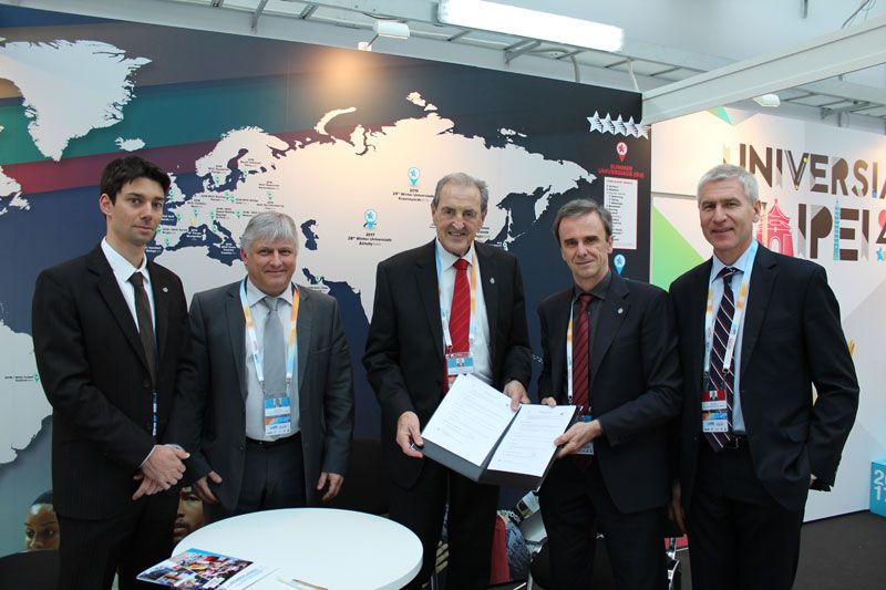 University sport booth with FISU and IFSC representatives