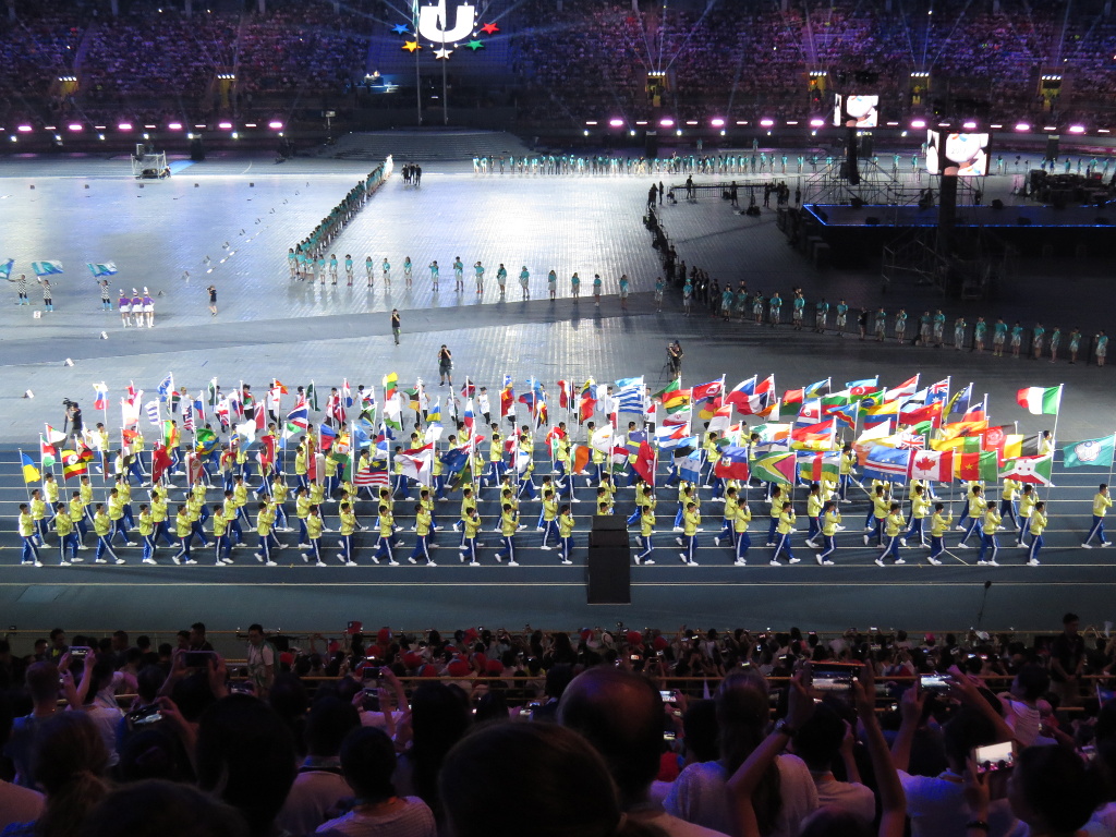 Flags of the participating countries, followed by the participants