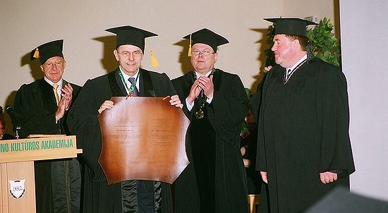 from the left: Professor of Catholic University of Leuven Mr. Herman Van Coppenolle, the President of International Olympic Committee Mr. Jacque Rogge, the President of Lithuanian National Olympic Committee Mr. Arturas Poviliunas, Chairman of Senate of Lithuanian Academy of Physical Education Mr. Aleksas Stanislovaitis