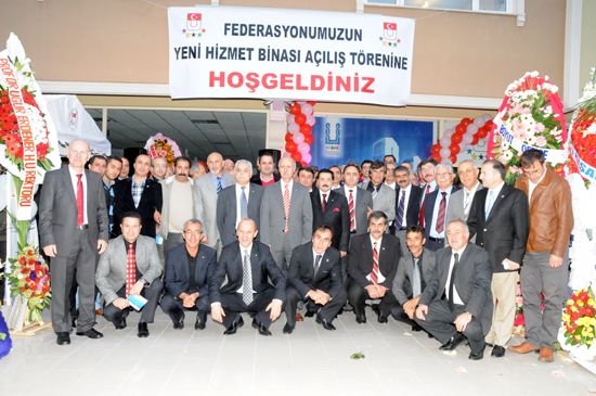 Group photo in front of new offices